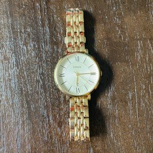 Gold fossil watch